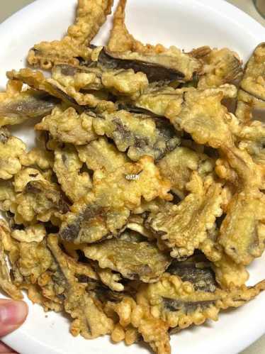 干炸蘑菇的做法_干炸蘑菇的做法视频教程